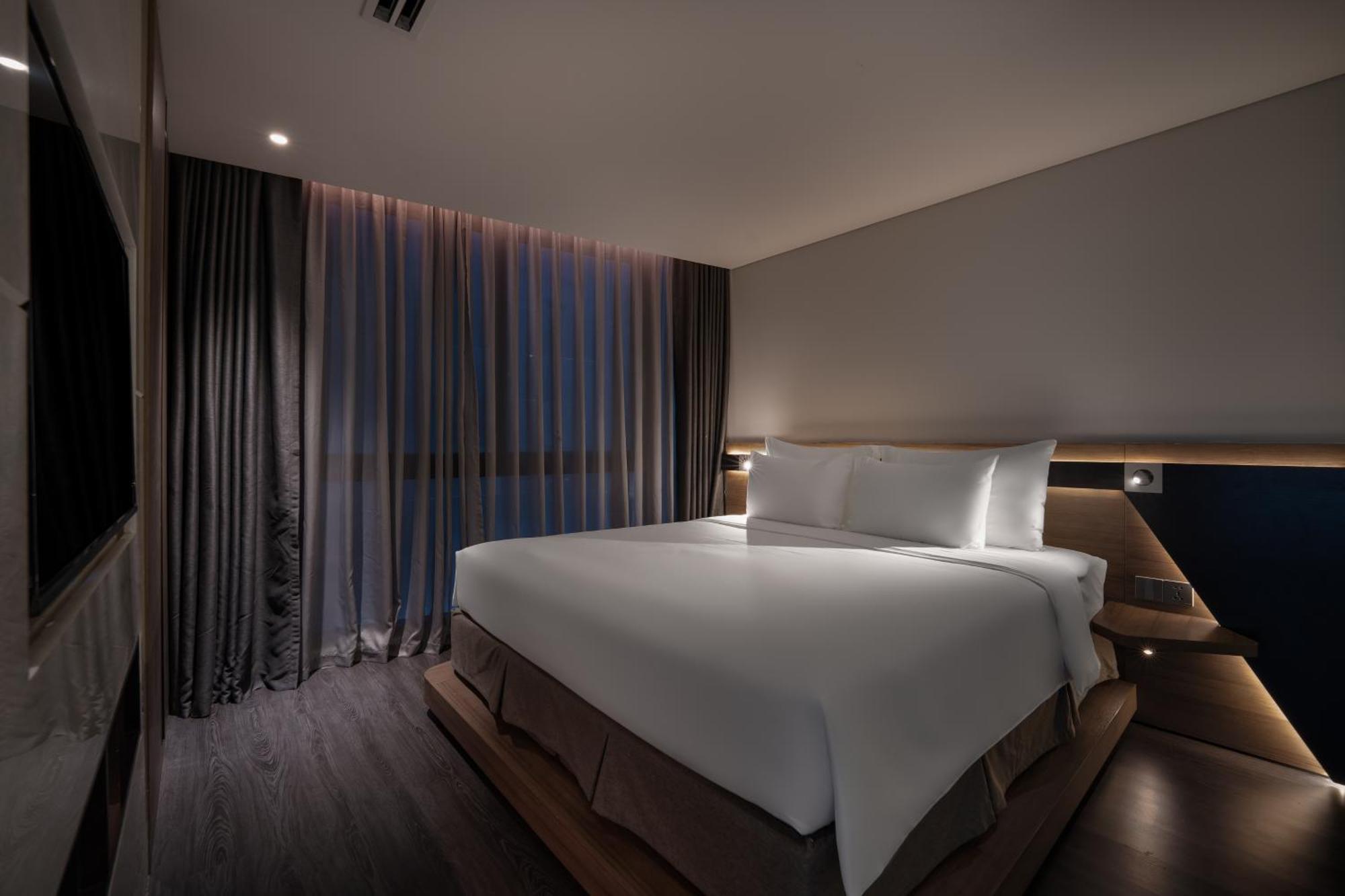 Draco Hotel & Suites Дананг Номер фото